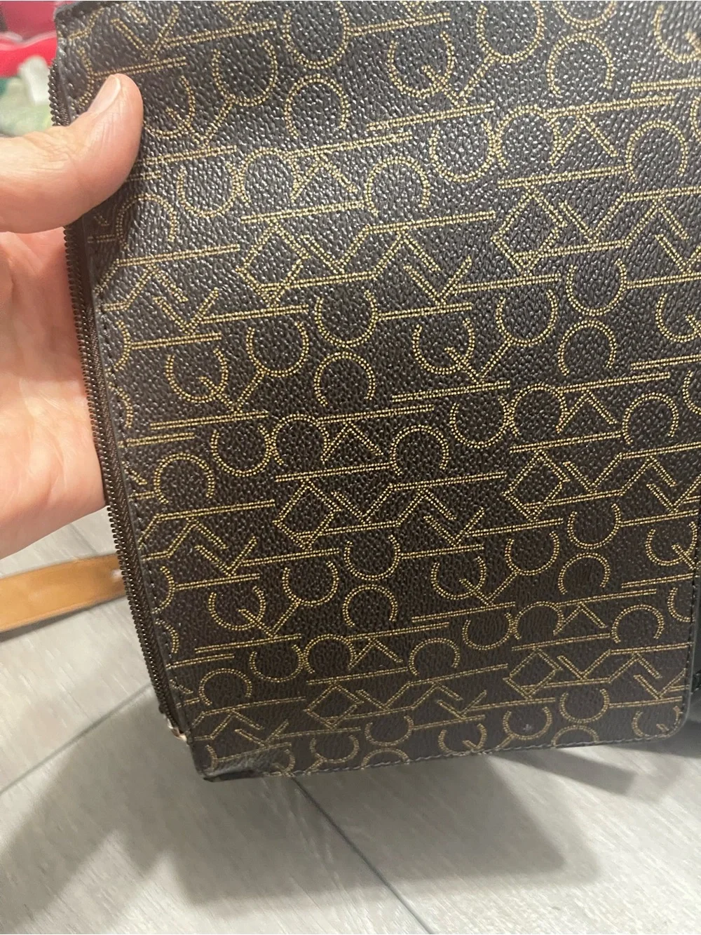 (Not sure if it’s authenticCalvin Klein Black Leather Laptop Tote with Gold Logo